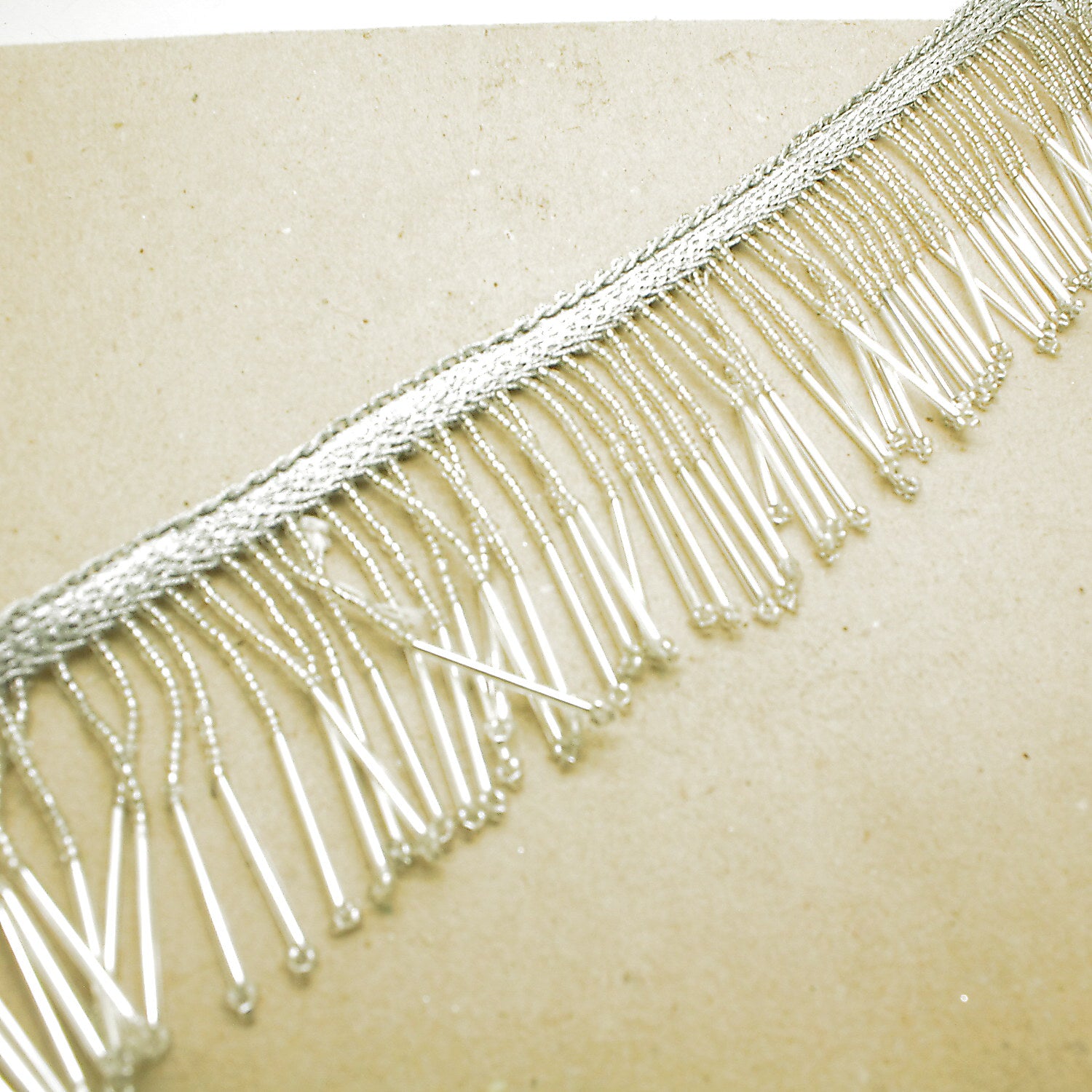 2.5 INCH SILVER BEADED FRINGE TRI