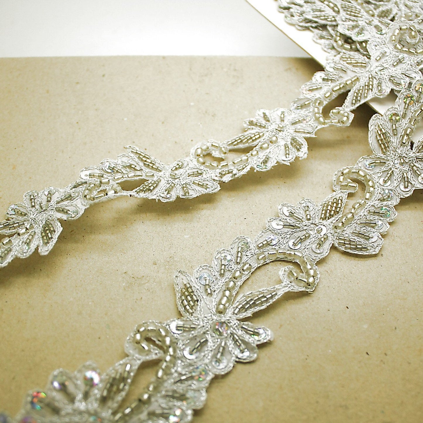 WHITE SILVER FLORAL BEADED TRIM - sarahi.NYC
