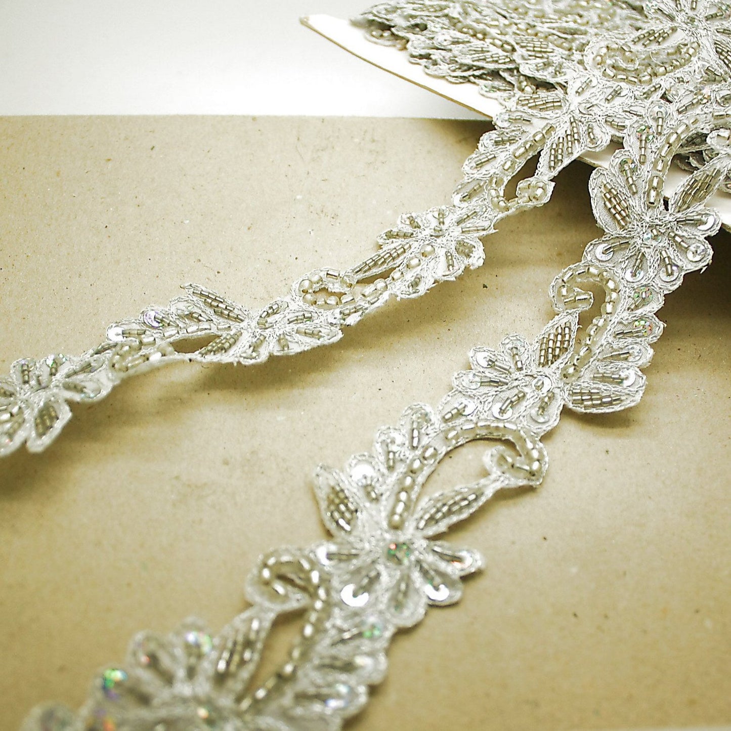 WHITE SILVER FLORAL BEADED TRIM - sarahi.NYC